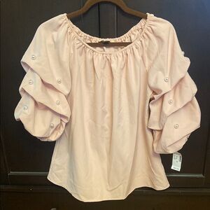 Chic Blush Pink Ruffled Blouse with Pearls on Sleeves